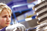 Woman working with engine