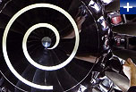 Front fan of a Trent 1000 engine showing its swept wide-chord blade design